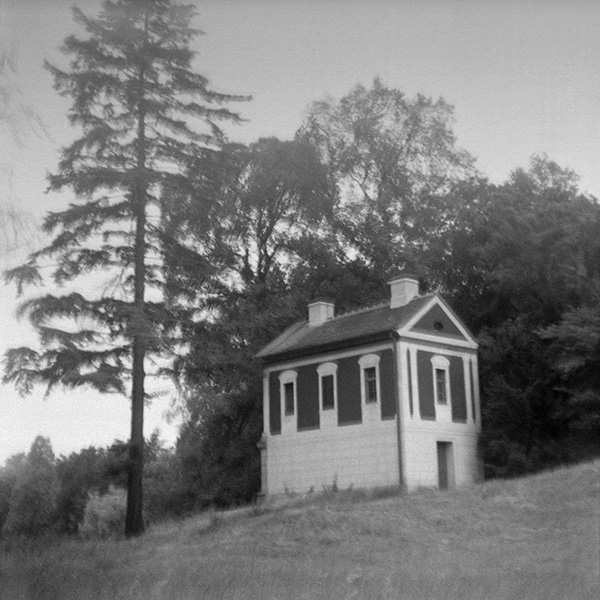 black and white photo of a small house