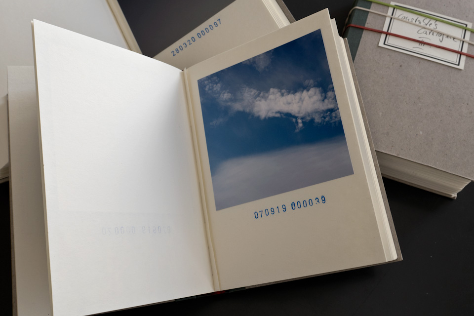 open book showing cloud photos