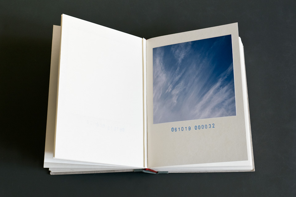 open book showing a cloud photo