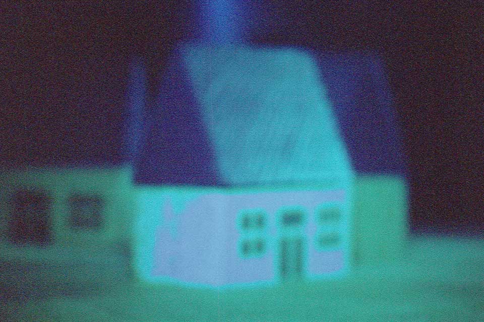 video projection, blue-green houses