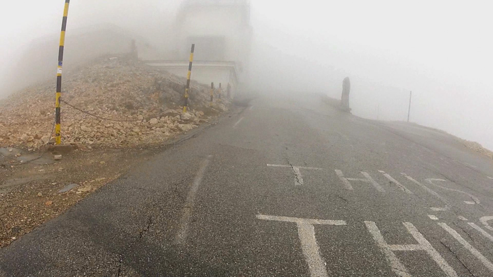 top of Mount Ventoux in the fog, video still