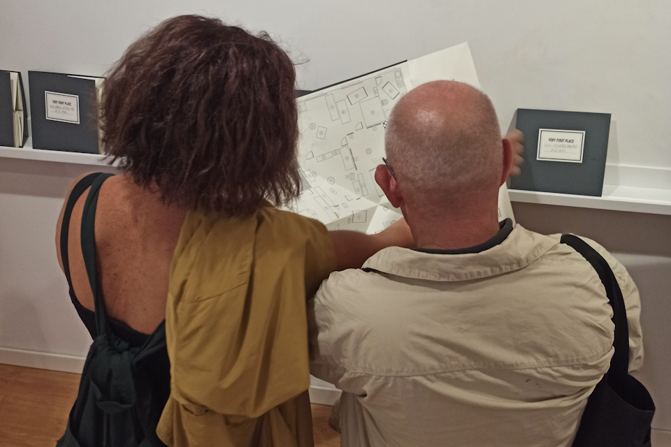 visitors studying a map